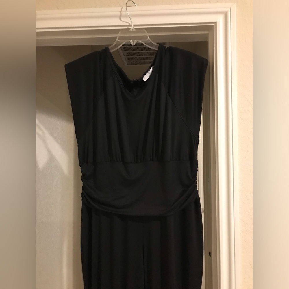 Padded shoulder, sleeveless jumpsuit, back zipper, ruched legs
